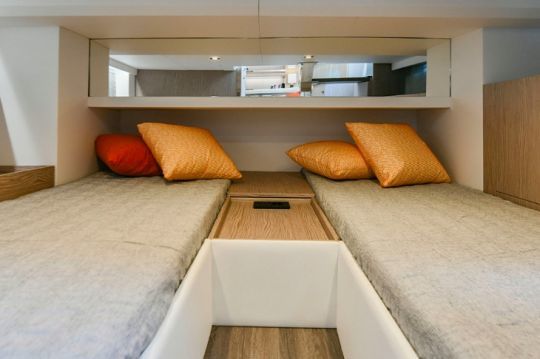 Deux lits simples qu'il est possible de transformer en couchage double