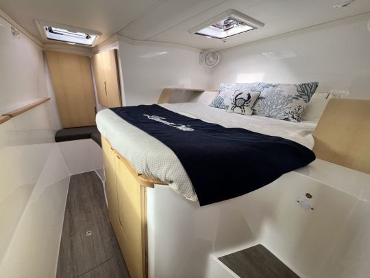 The owner cabin features a queen size bed